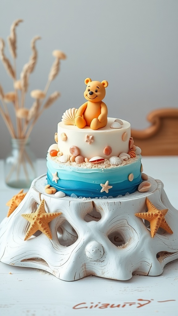 A two-tier Winnie the Pooh cake with beach-themed decorations and a cute Pooh Bear figurine on top.